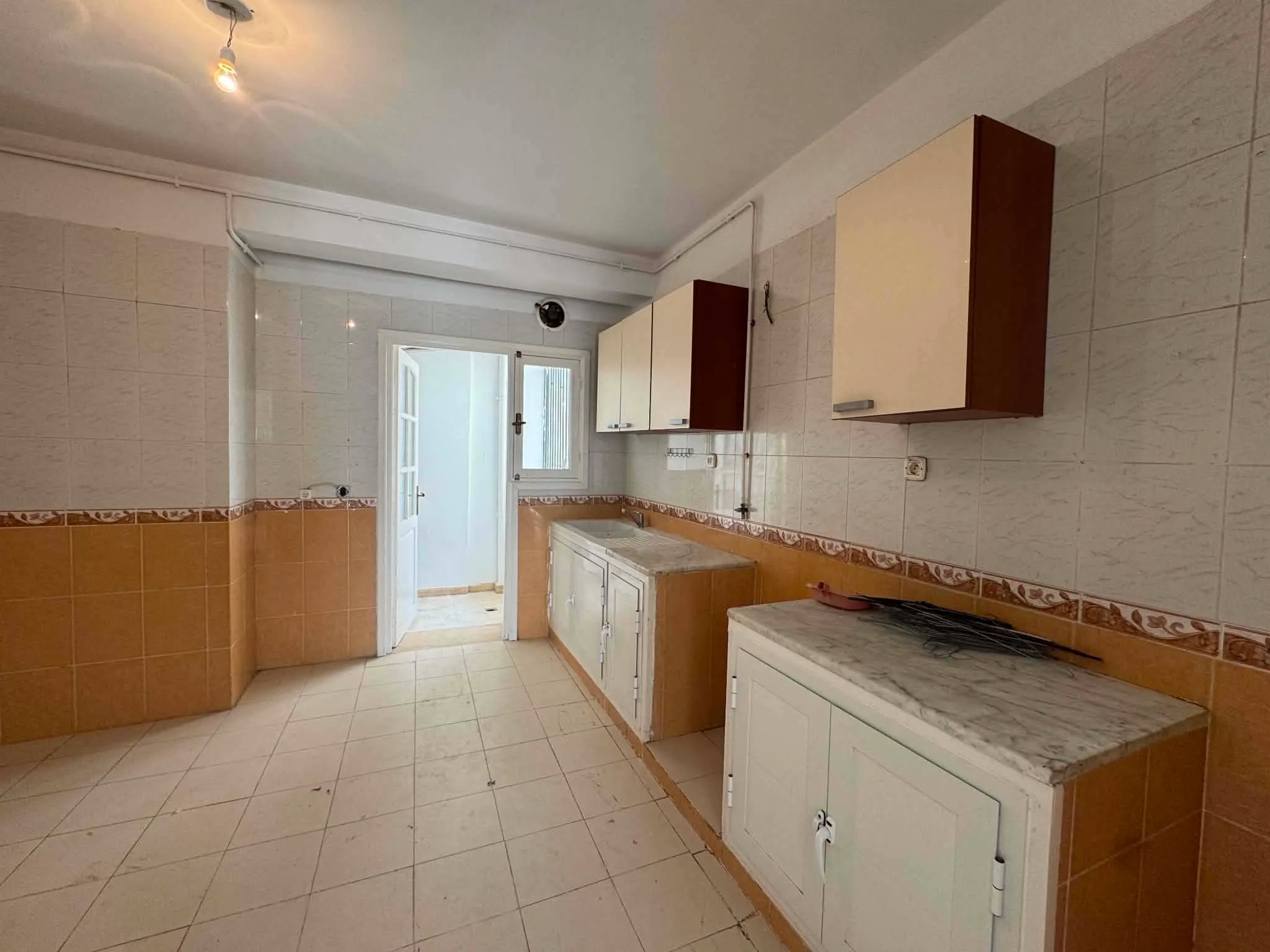 un appartement s+2 au 3éme étage(doubles ascenseurs) a louer a ennacer 2 prés de zen
