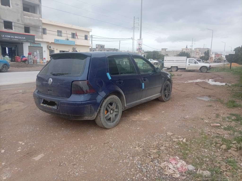 A vendre ou echange avec bmw essence Golf 4 TDI bonde rouge