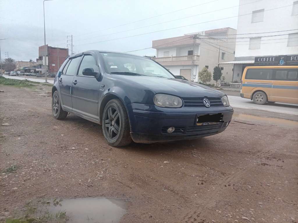 A vendre ou echange avec bmw essence Golf 4 TDI bonde rouge