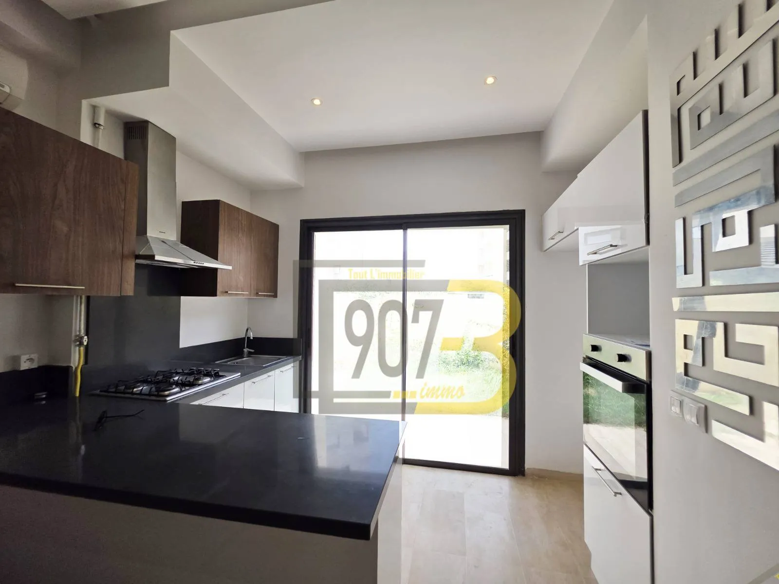 a Louer un appartement s+2 avec jardin à enassr 2