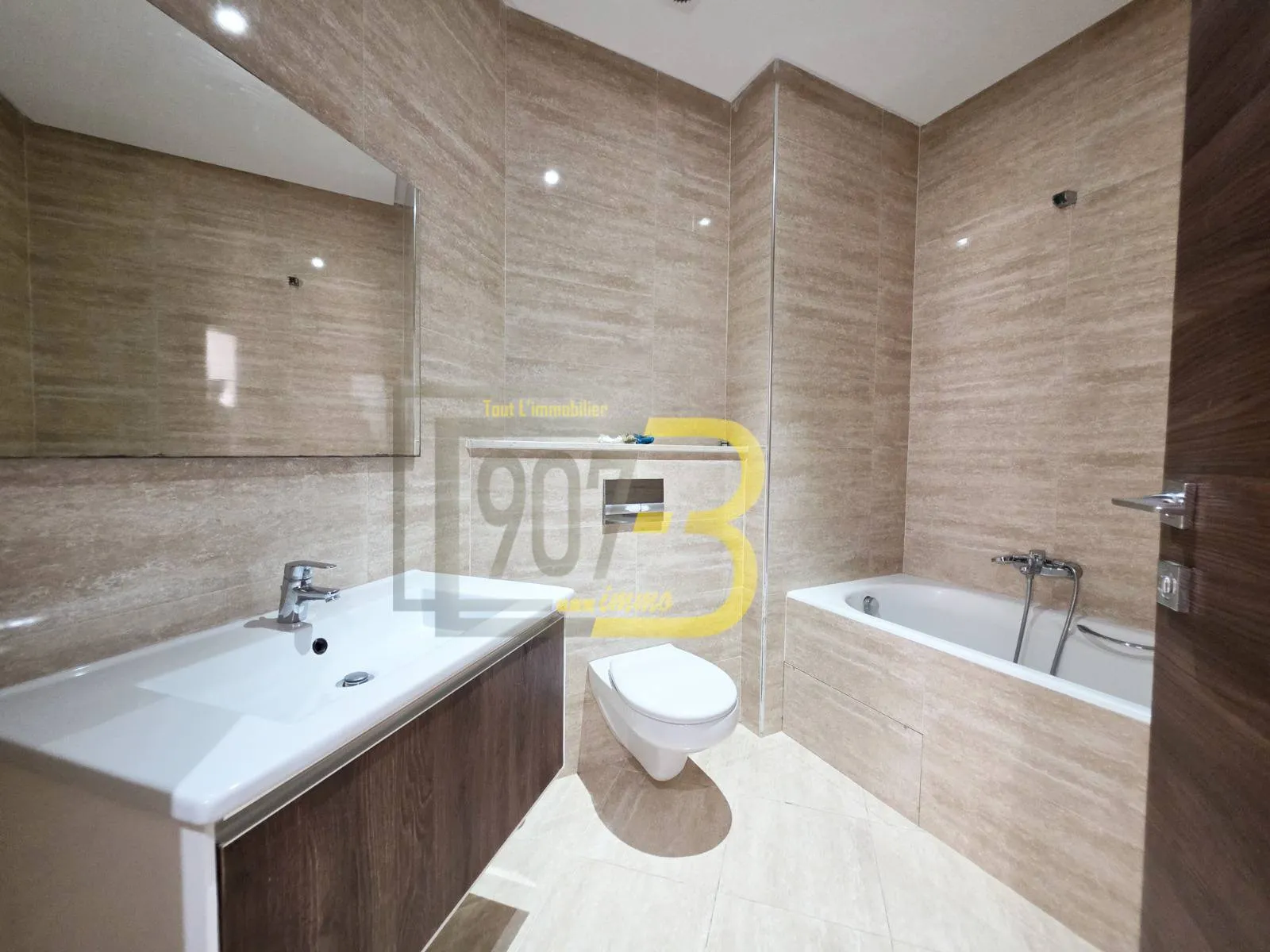 a Louer un appartement s+2 avec jardin à enassr 2