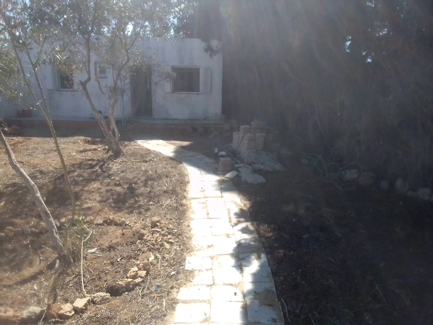 terrain 310 m 2 et maison route plage mami 