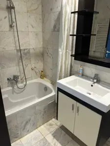 un appartement s+3 vide au 7éme étage(avec doubles ascenseurs) a louer a Manzah 9C