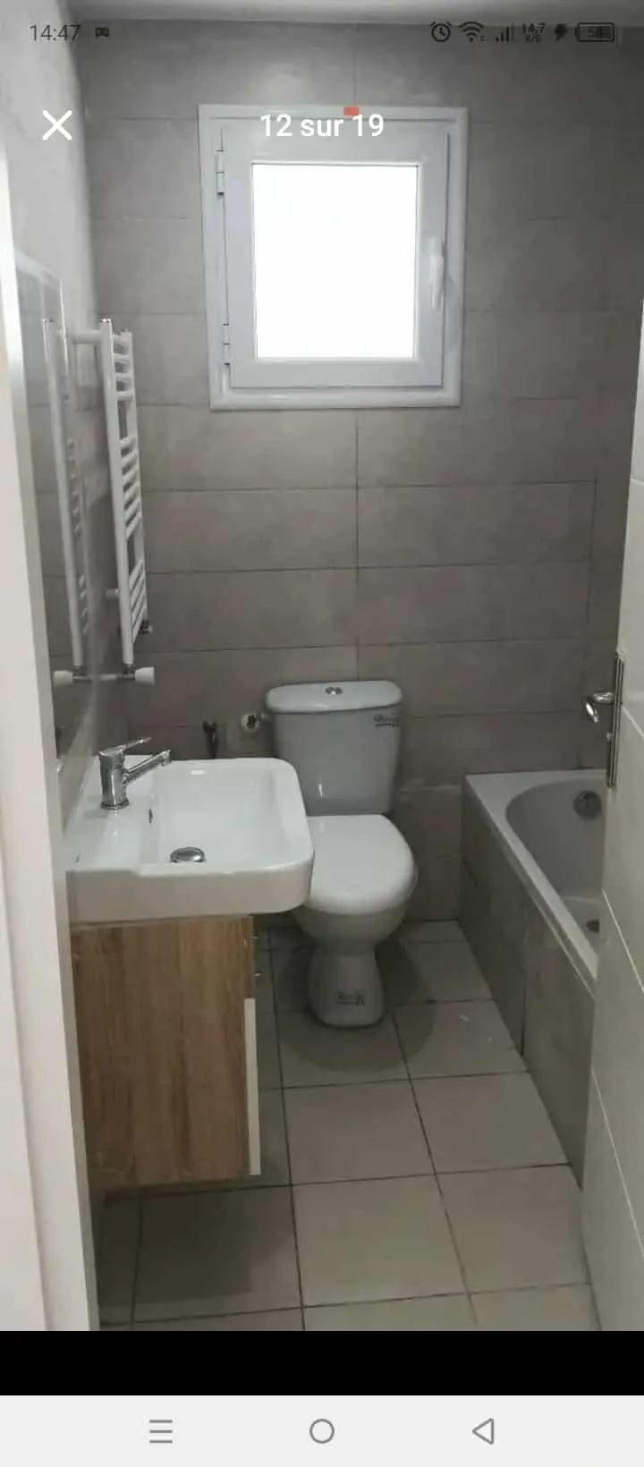 un appartements s+2 hs neuf au 5éme étage(avec ascenseur) a louer a Enkhilette