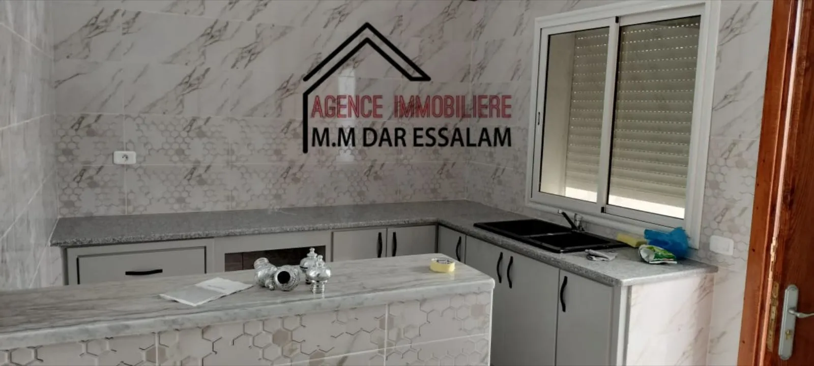 maison avec un garage près de toutes commodités