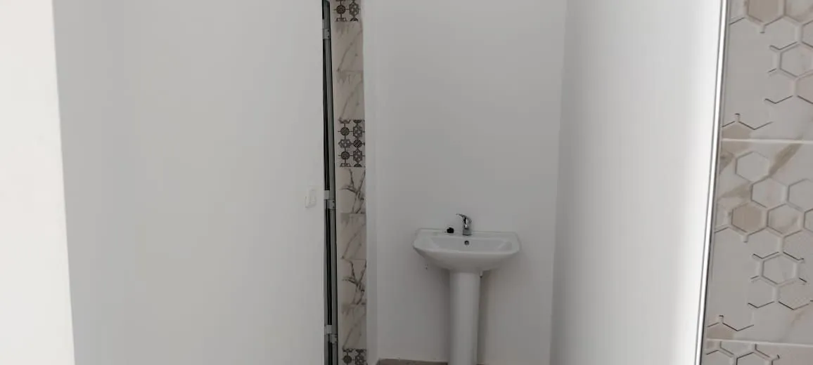 maison avec un garage près de toutes commodités