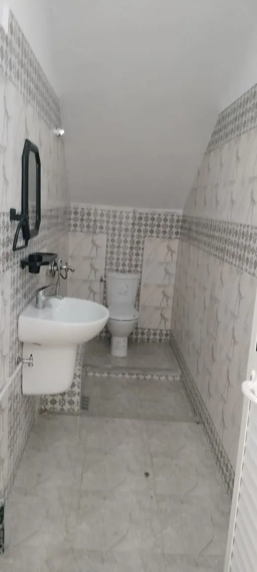 maison avec un garage près de toutes commodités