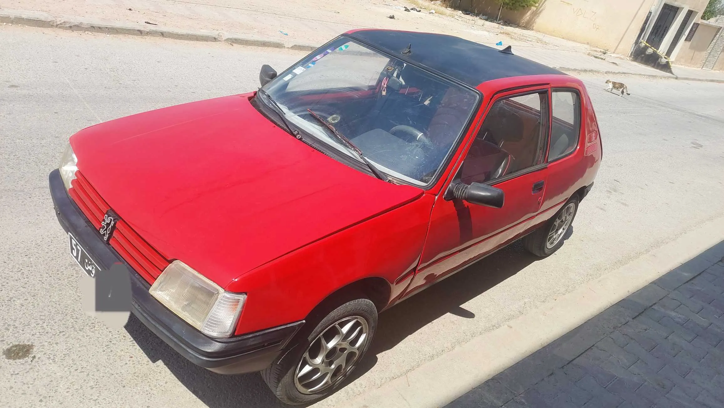 A vendre 205 junior 4 ch essence 