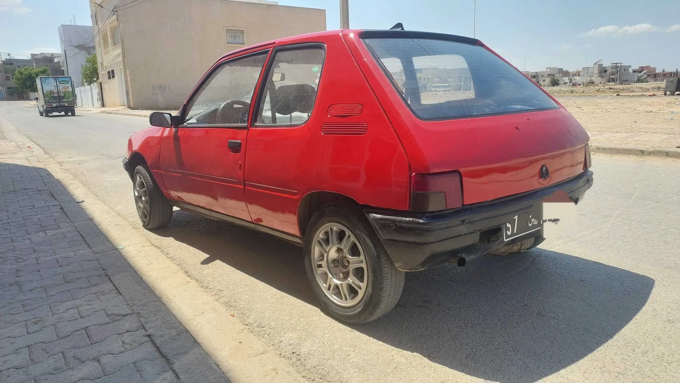 A vendre 205 junior 4 ch essence 