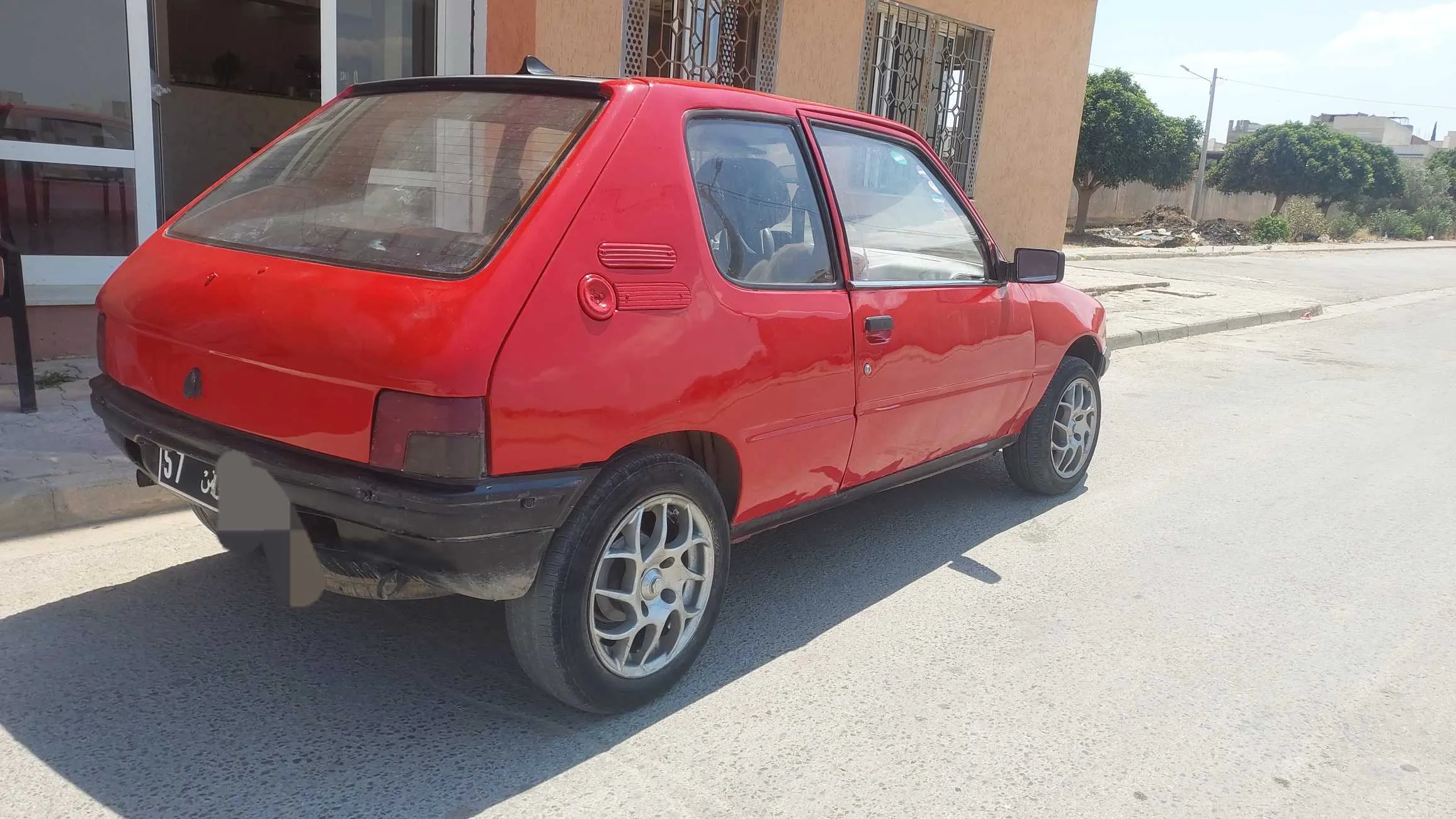 A vendre 205 junior 4 ch essence 