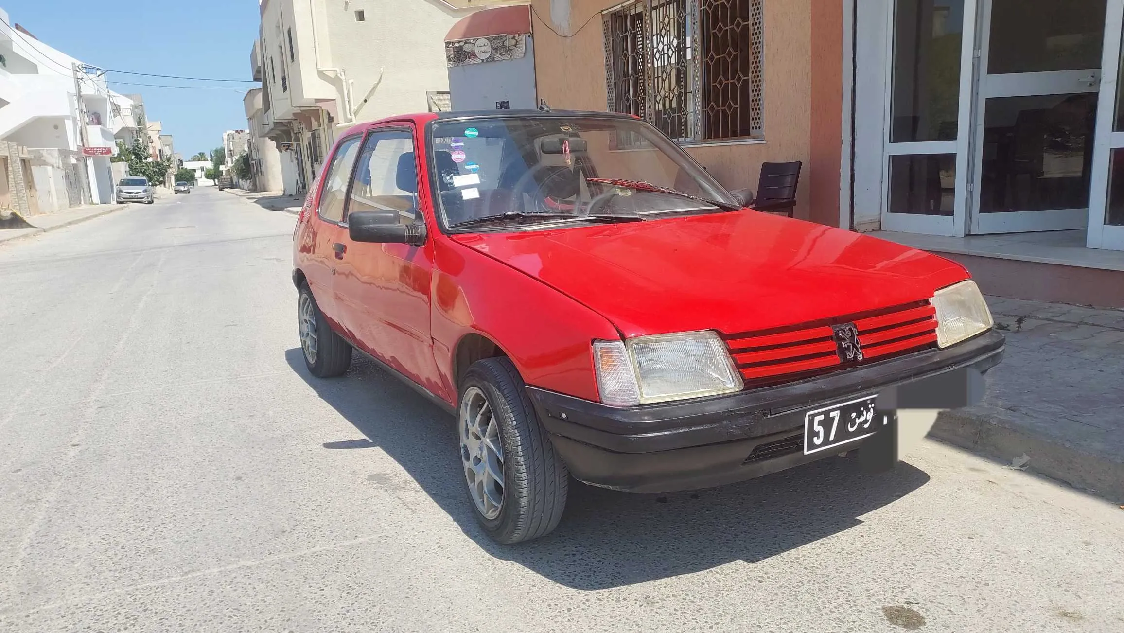 A vendre 205 junior 4 ch essence 