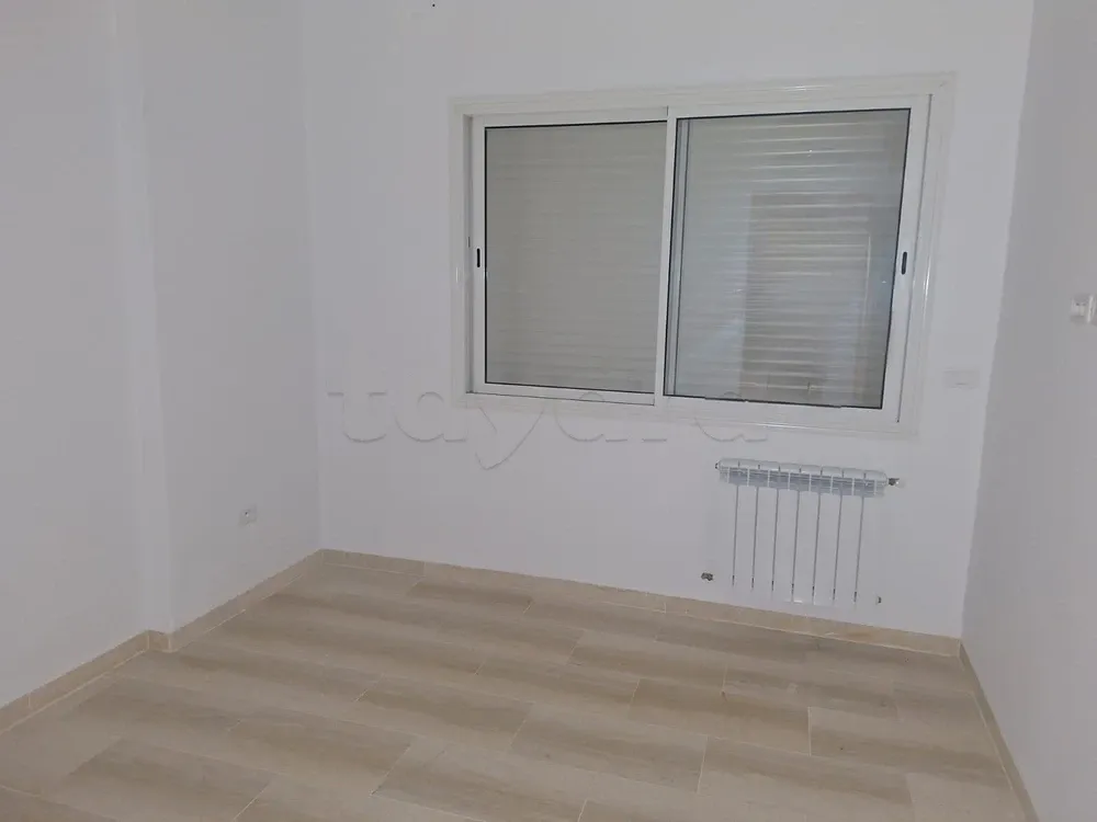 un appartement spacieux s+3 vide au 2éme étage(avec ascenseur) a louer situé a jardin d'el manzah 2