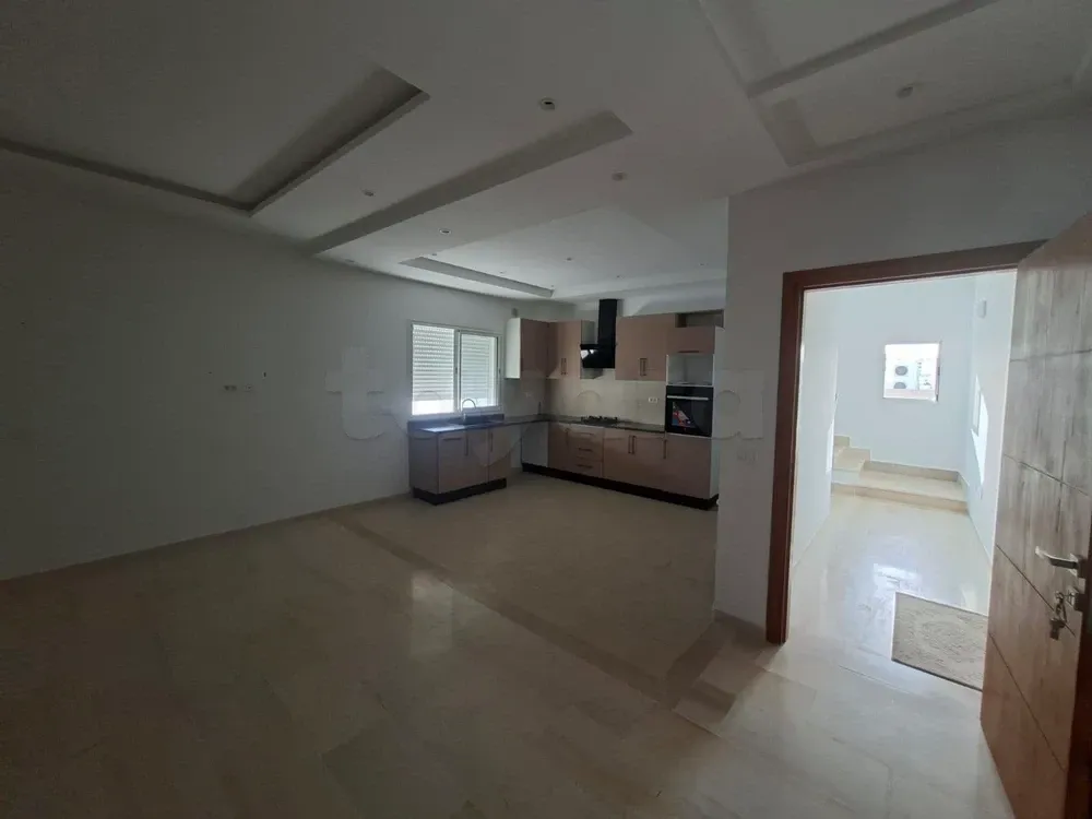 un appartement spacieux s+3 vide au 2éme étage(avec ascenseur) a louer situé a jardin d'el manzah 2