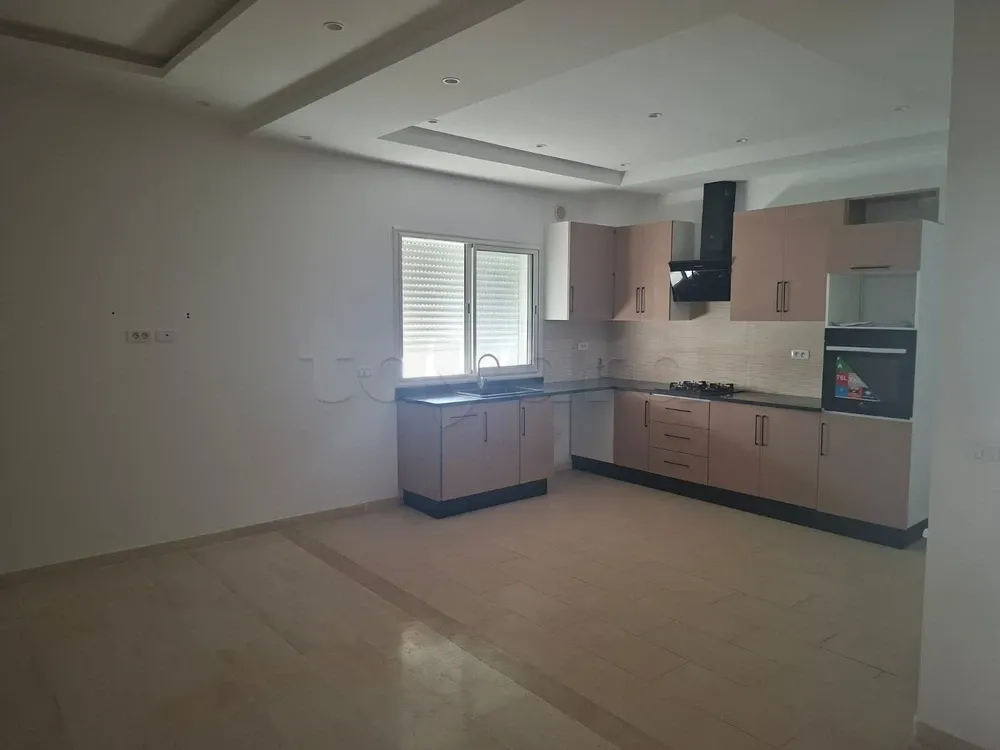 un appartement spacieux s+3 vide au 2éme étage(avec ascenseur) a louer situé a jardin d'el manzah 2