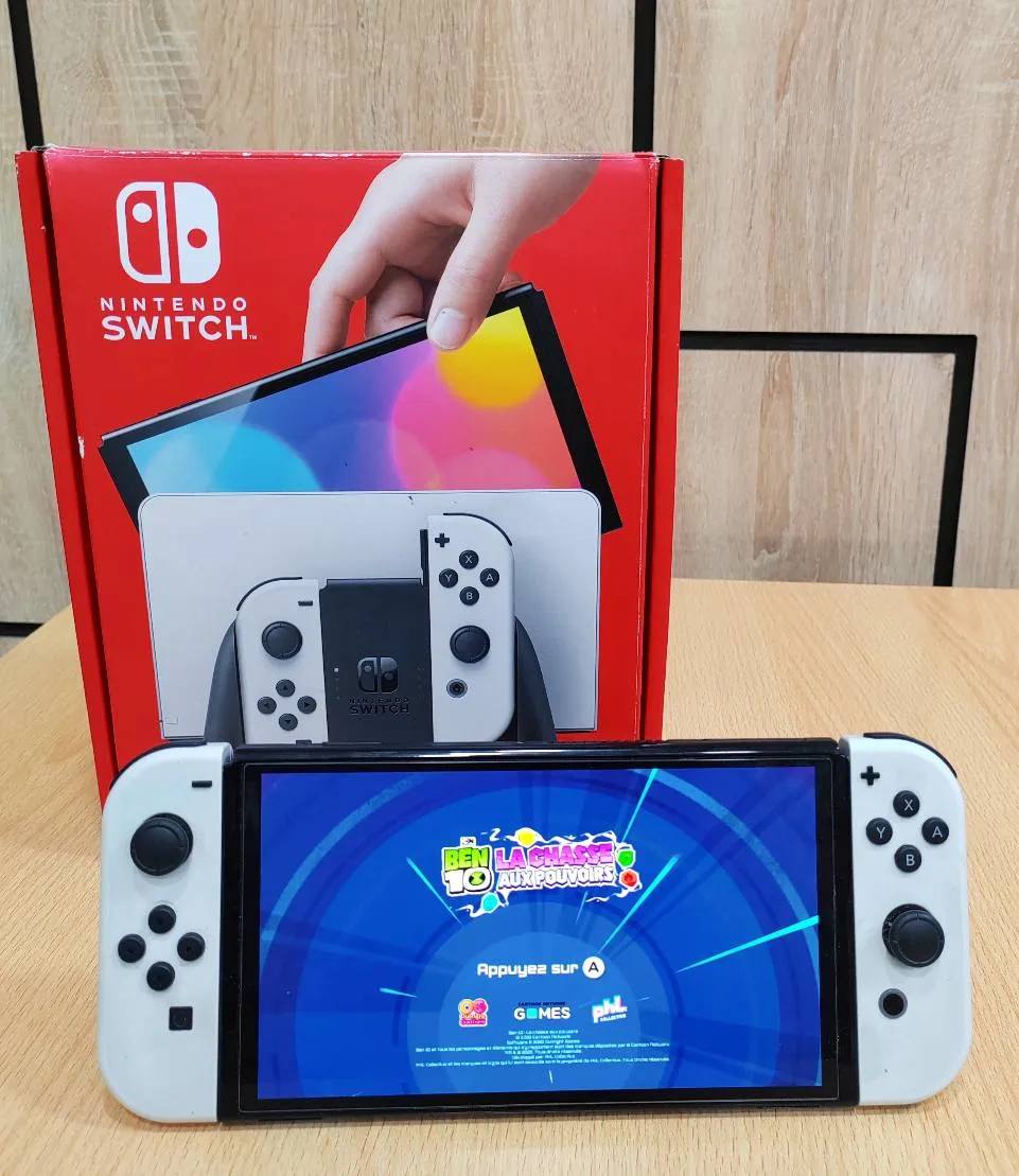 ✨ Nintendo Switch OLED White Edition ✨✨ Importé 🇫🇷 En très bonne état ✨️✨️✨️ Patché Pleine de jeux