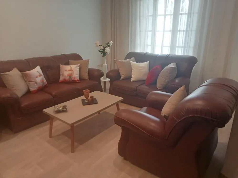 Salon cuir marron en bonne état 7 place