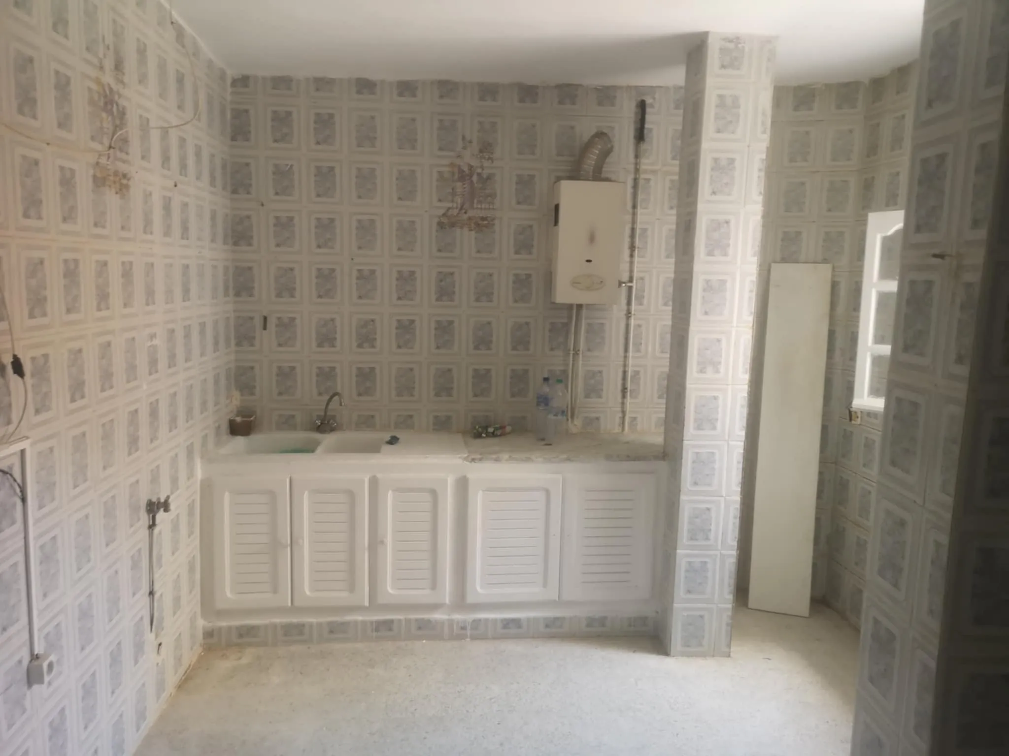 un appartement RDC s+2 vide situé à Menzah 9c