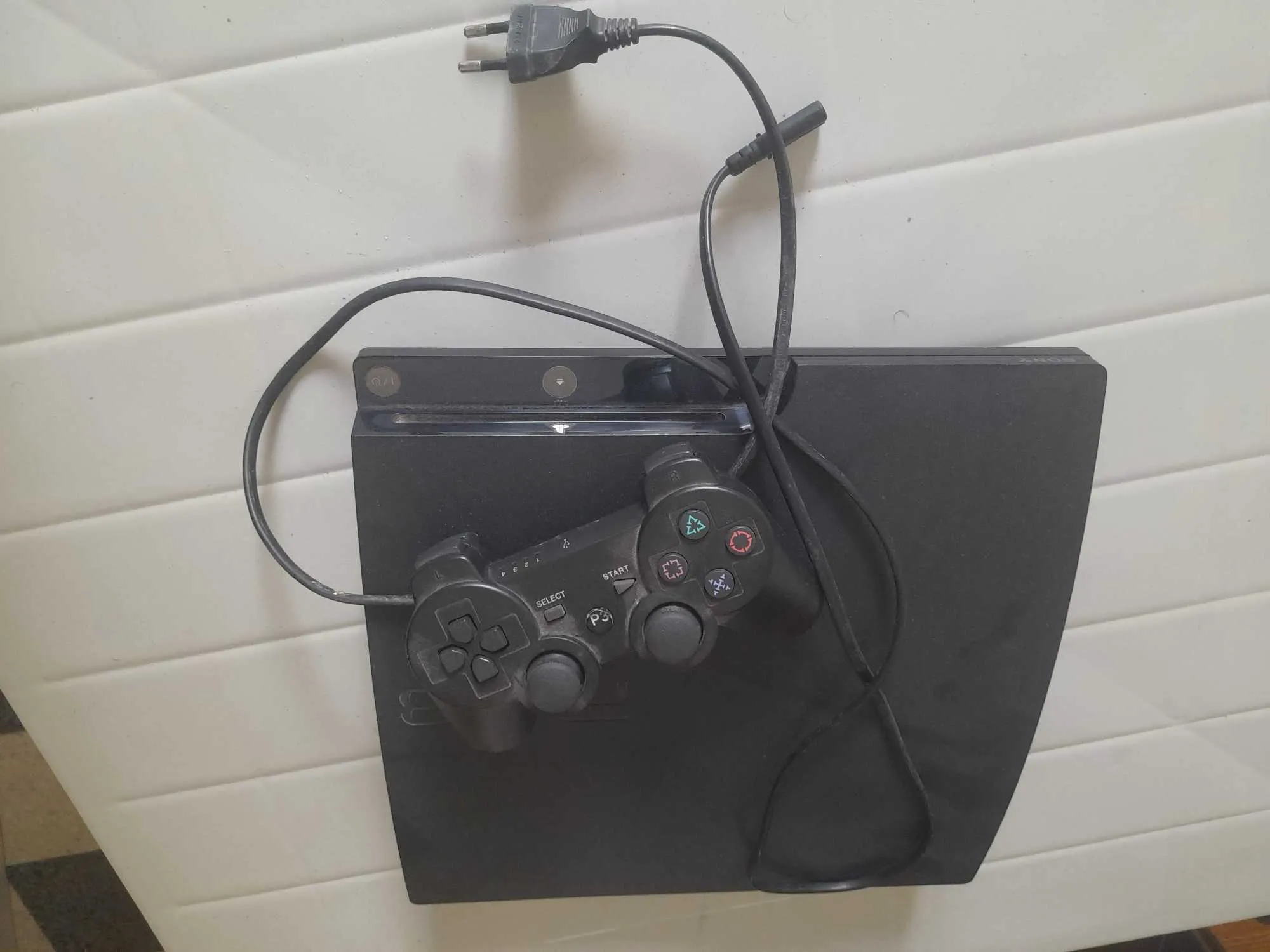Playstation 3 slim patché avec jeux 