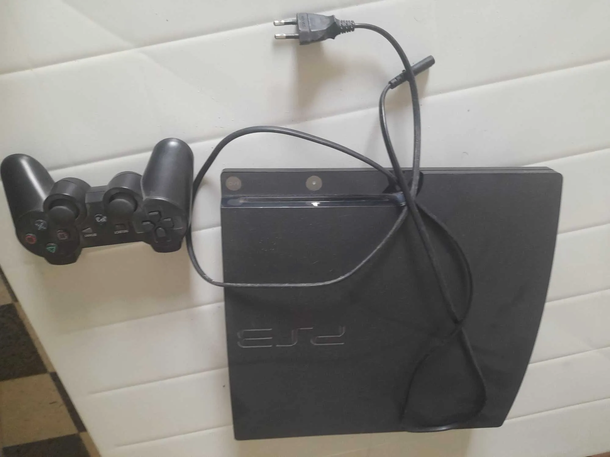 Playstation 3 slim patché avec jeux 