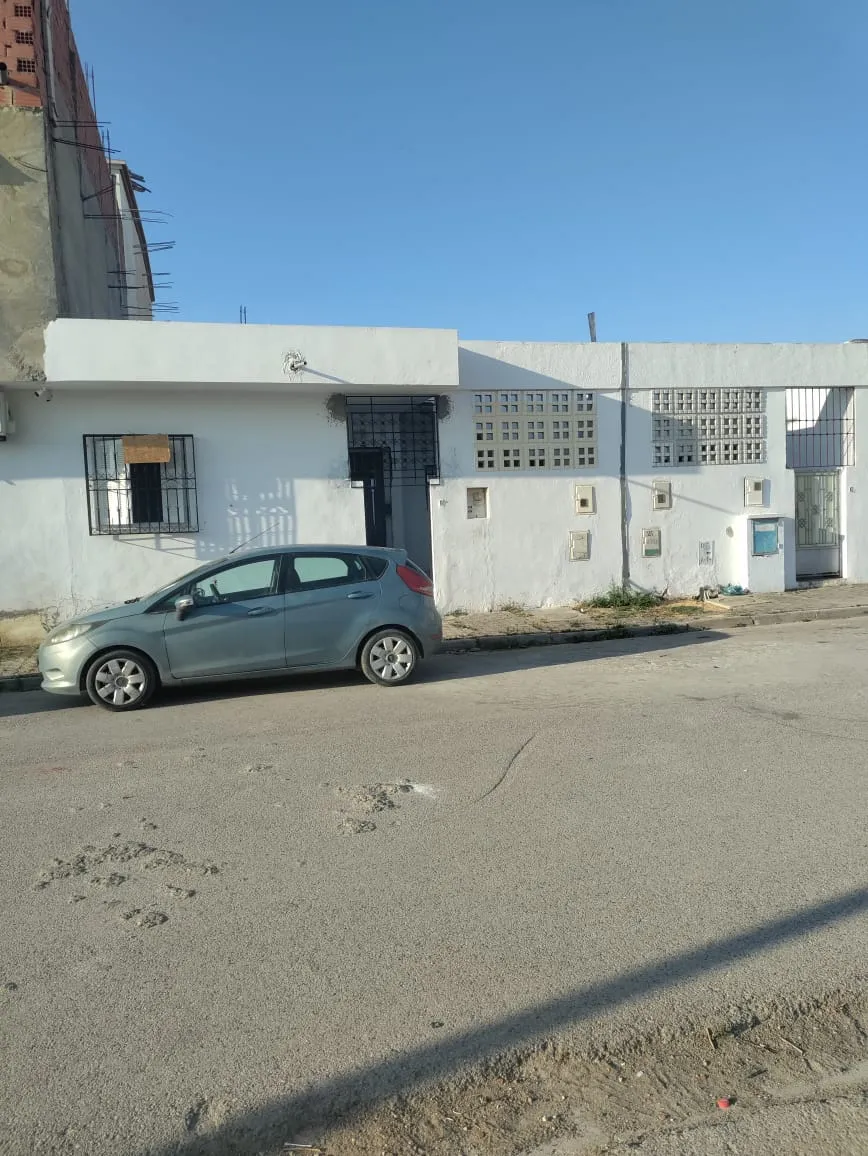 maison récemment bati avec titre bleu