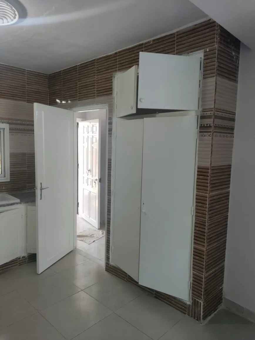 maison récemment bati avec titre bleu