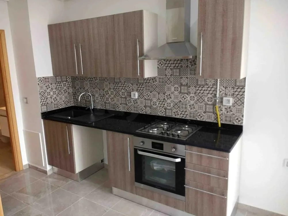 un appartement s+1 haut standing au 4éme étage (avec doubles ascenseurs) a louer a Manzah 9c