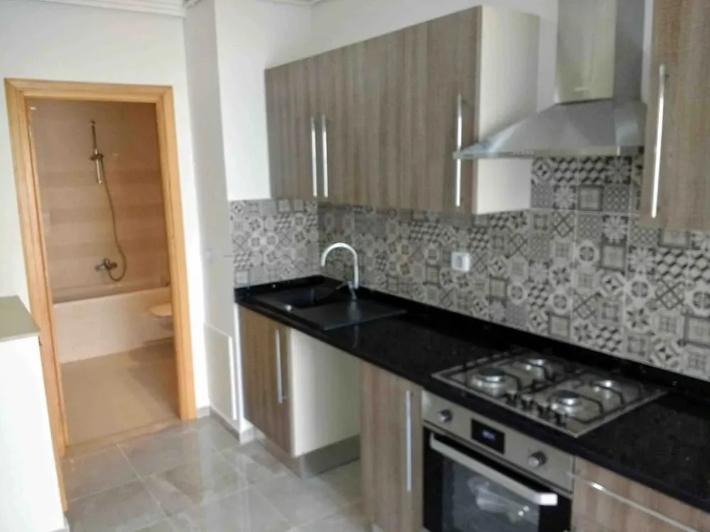 un appartement s+1 haut standing au 4éme étage (avec doubles ascenseurs) a louer a Manzah 9c