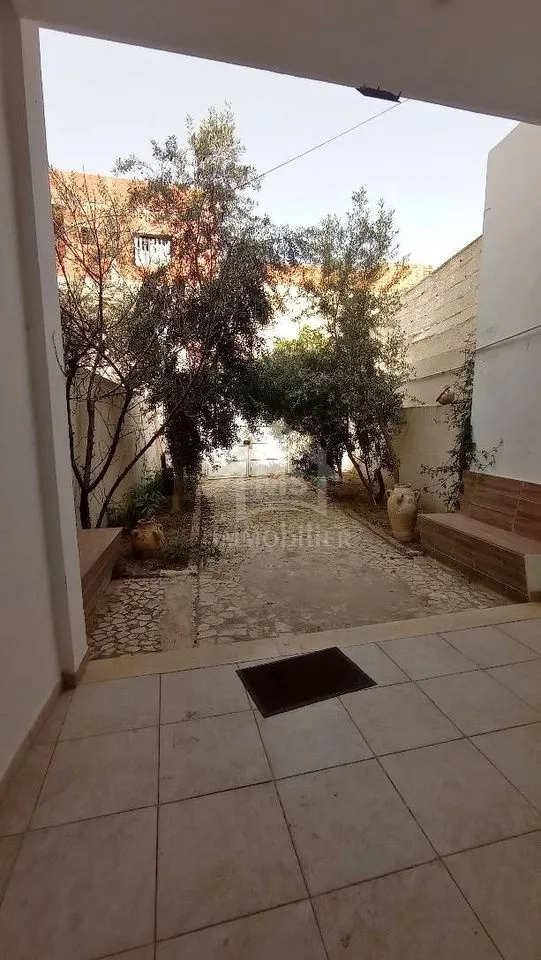 Un spacieux appartement S+2 RDC à vendre à Nabeul 51355351