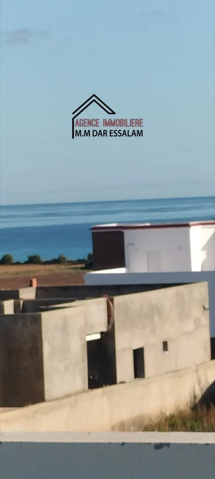 maison style américain près de la mer