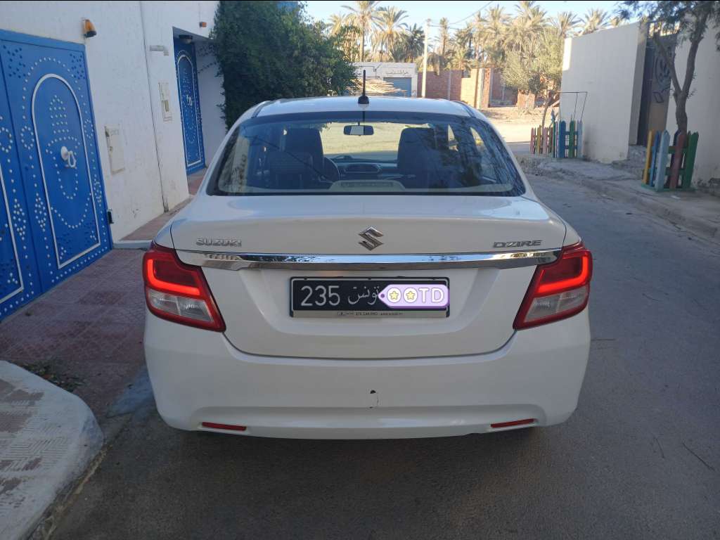 SUZUKI DZIRE ESSENCE TEL 40884251