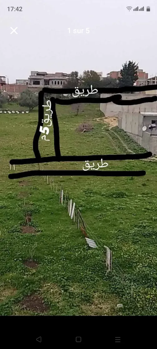 أرض مقسمة و مسجلة للبيع