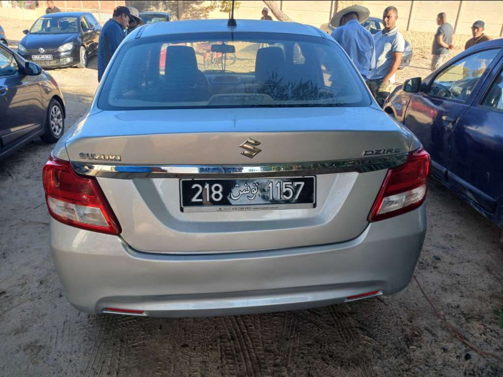SUZUKI DZIRE 1er main ESSENCE Tel 24 313 594