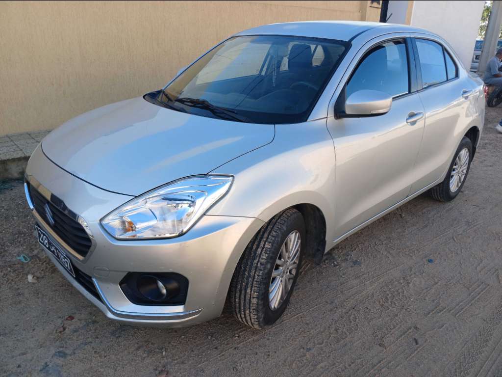 SUZUKI DZIRE 1er main ESSENCE Tel 24 313 594