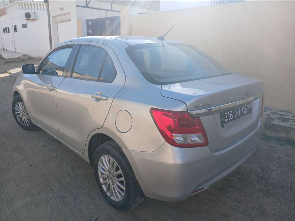 SUZUKI DZIRE 1er main ESSENCE Tel 24 313 594