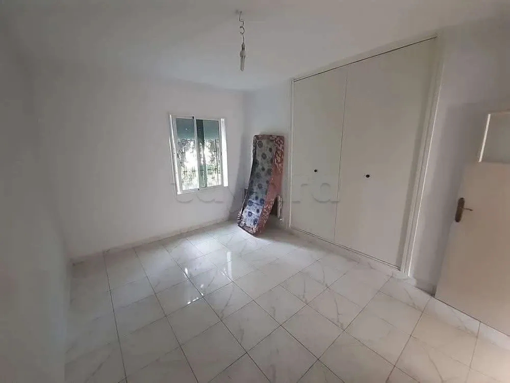 un appartement s+2 au rdc a louer situé a cité olympique en face kiosque agil