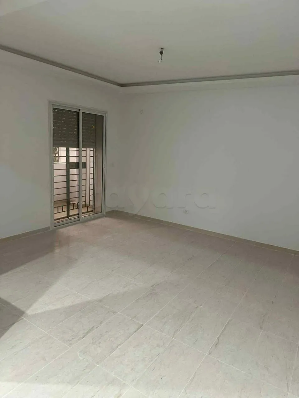 un appartement s+2 au RDC a louer situé a Borj Louzir Prés de Rond point l'Escale