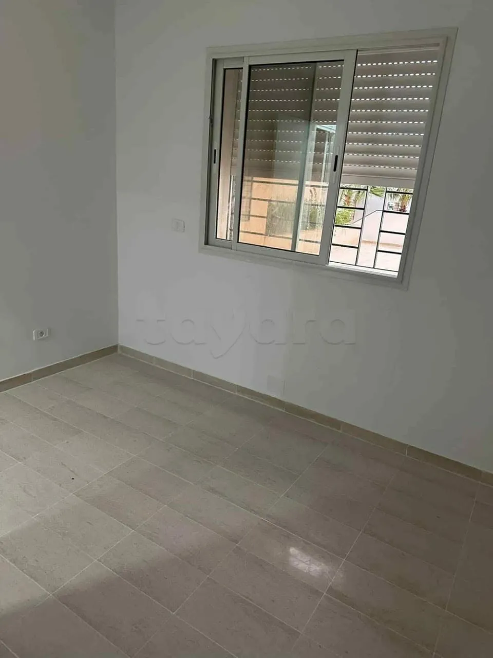 un appartement s+2 au RDC a louer situé a Borj Louzir Prés de Rond point l'Escale