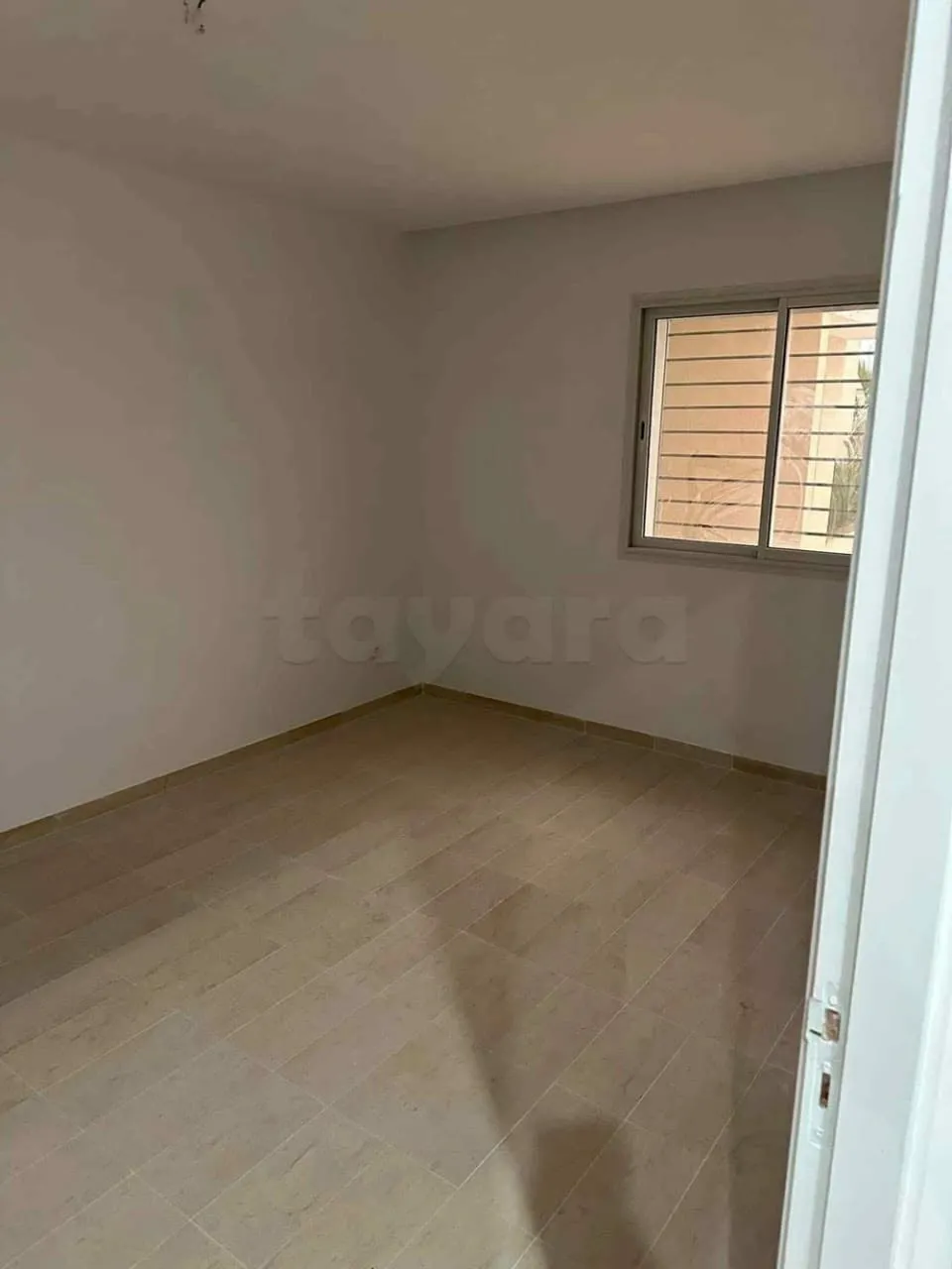 un appartement s+2 au RDC a louer situé a Borj Louzir Prés de Rond point l'Escale