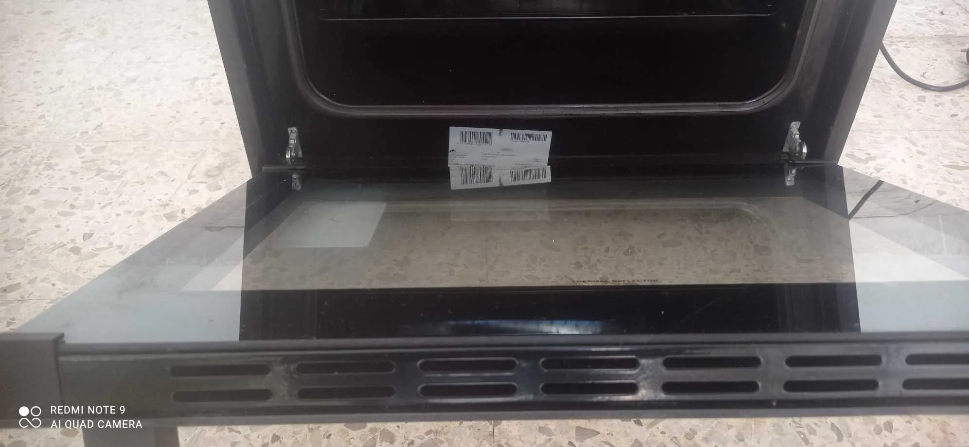 Four encastrable + plaque ( inox)