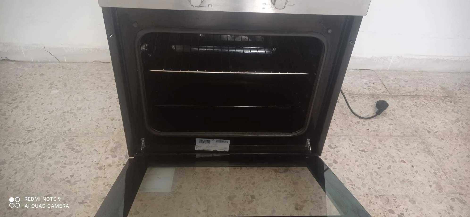 Four encastrable + plaque ( inox)