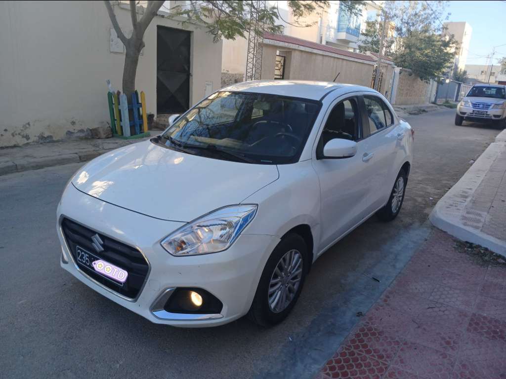 SUZUKI DZIRE ESSENCE TEL 40884251