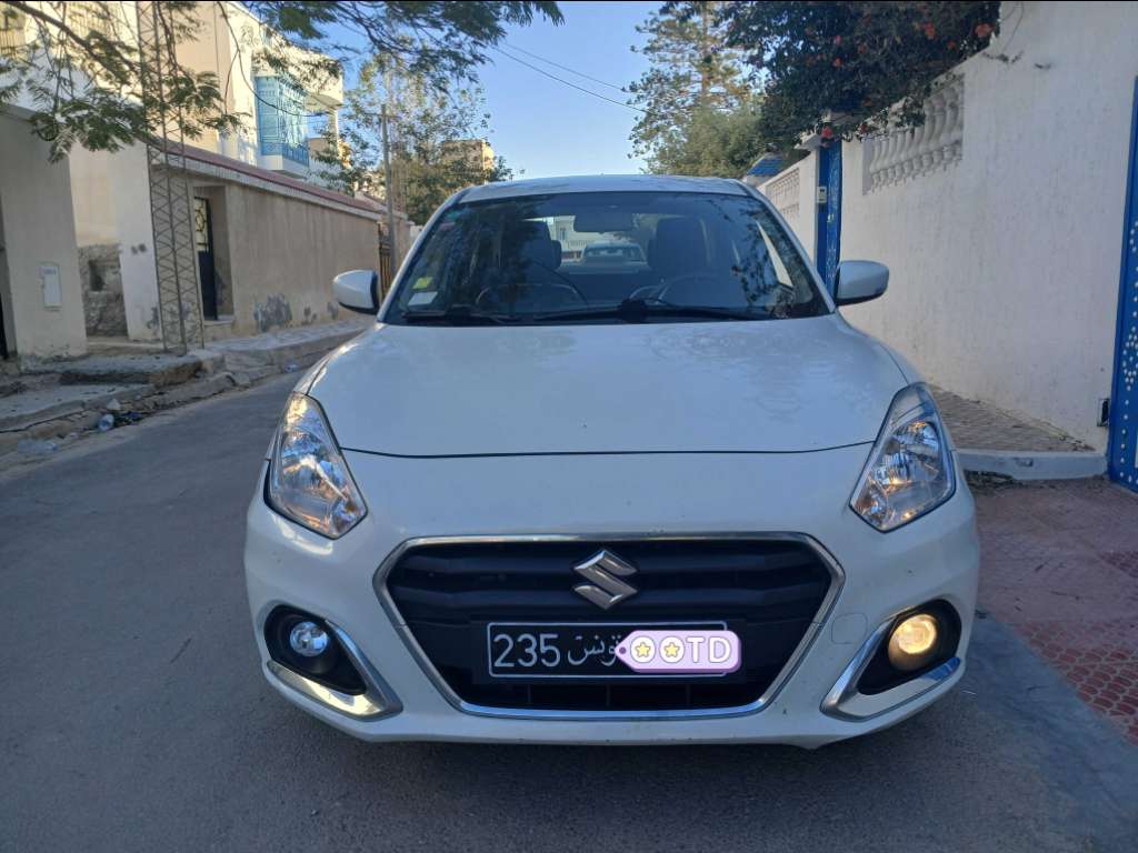 SUZUKI DZIRE ESSENCE TEL 40884251