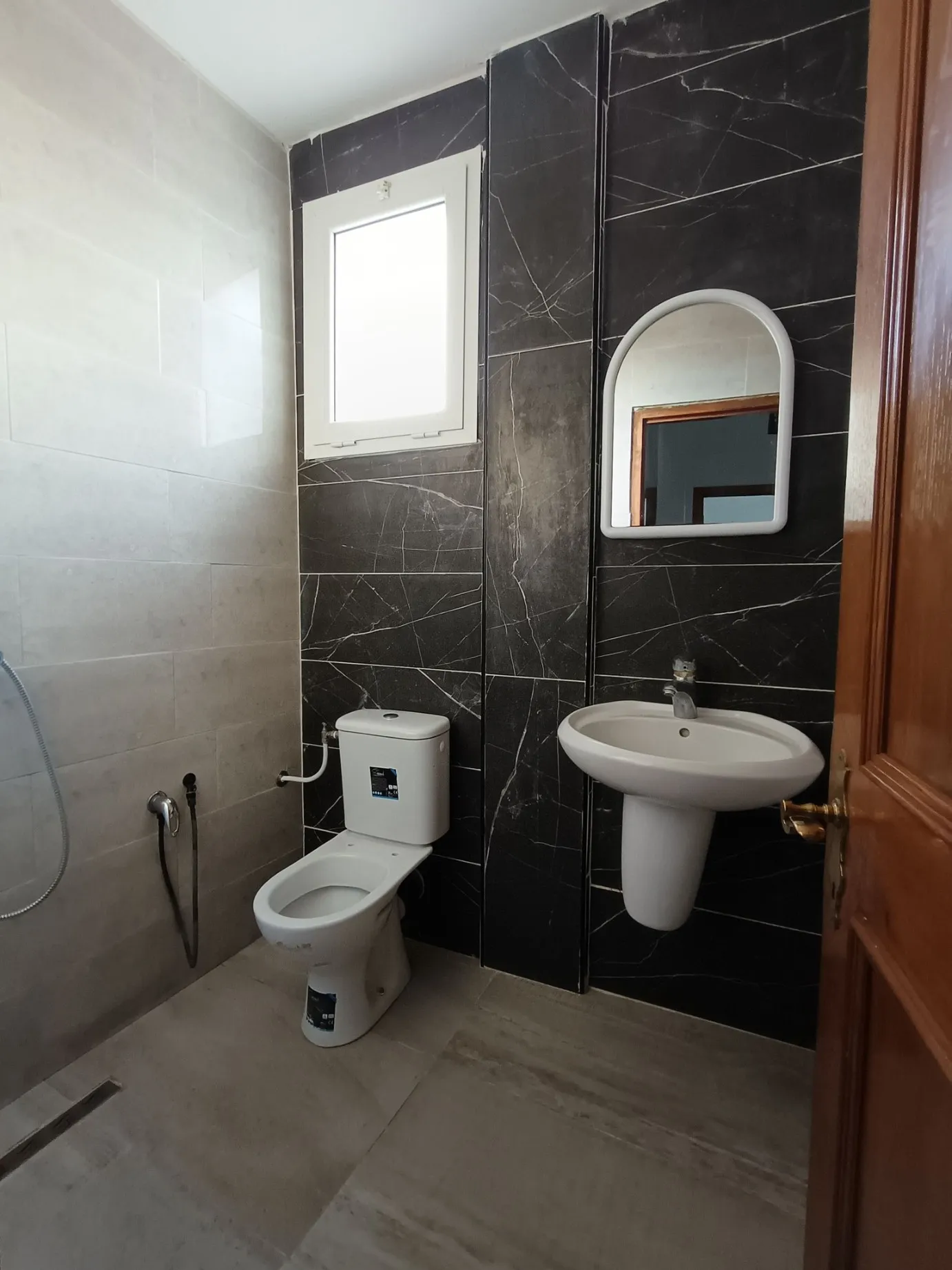 A vendre une maison de style américain s+3 au centre ville elhaouaria 