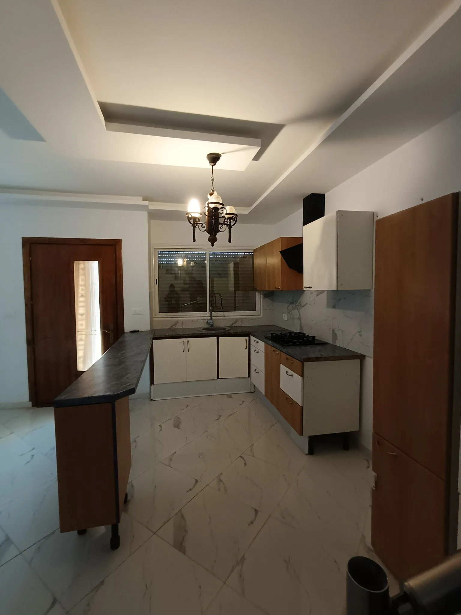 A vendre une maison de style américain s+3 au centre ville elhaouaria 