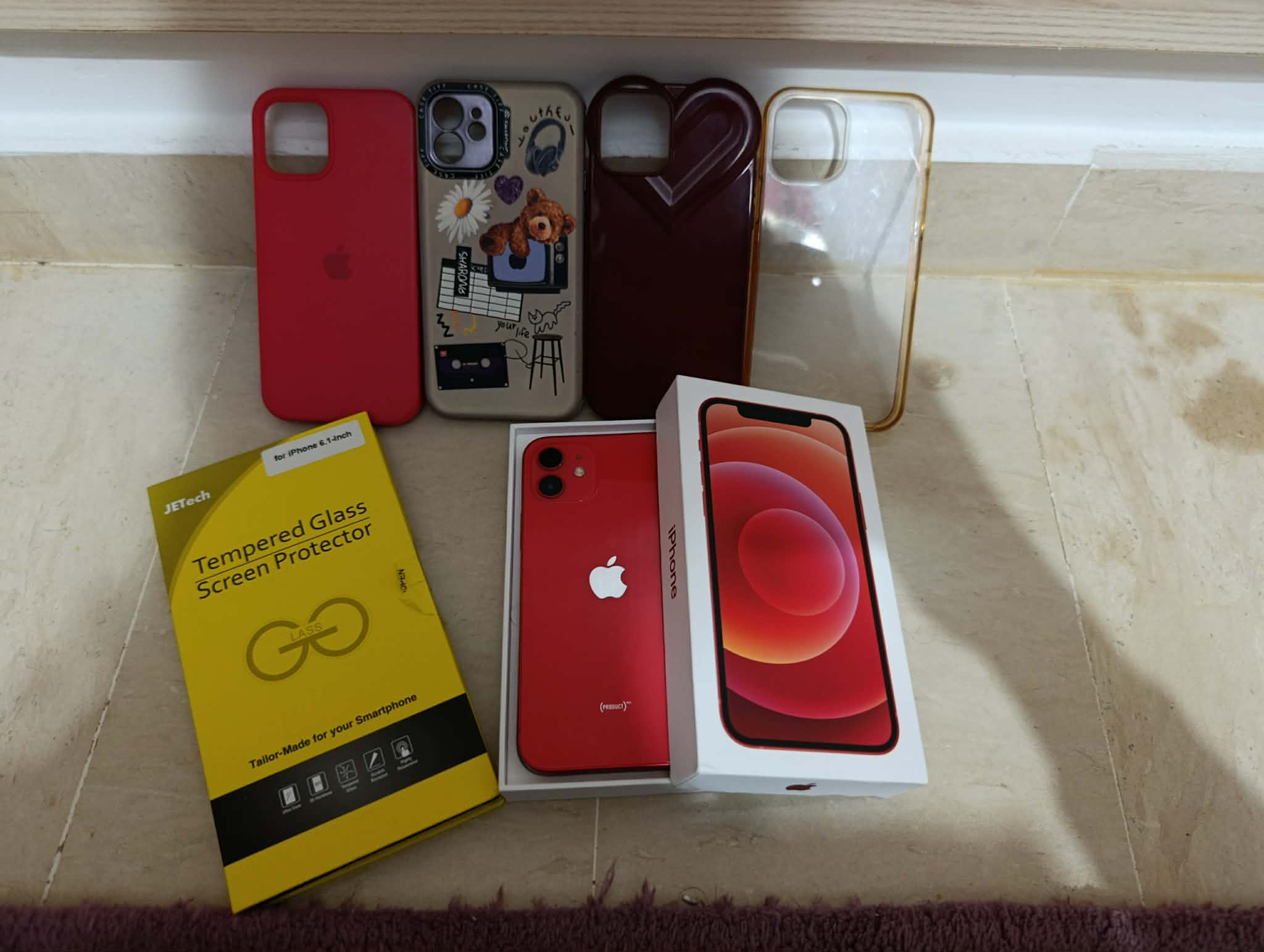 iPhone 12 (64 Go)- pack complet avec boîte et coque et film 