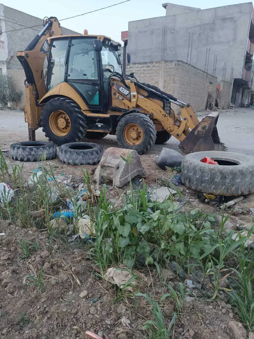 Tractopelle caterpillar 428F état Bien
