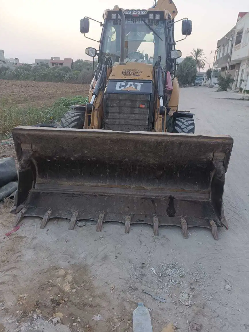 Tractopelle caterpillar 428F état Bien
