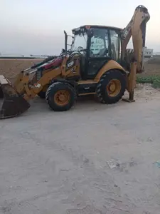 Tractopelle caterpillar 428F état Bien 