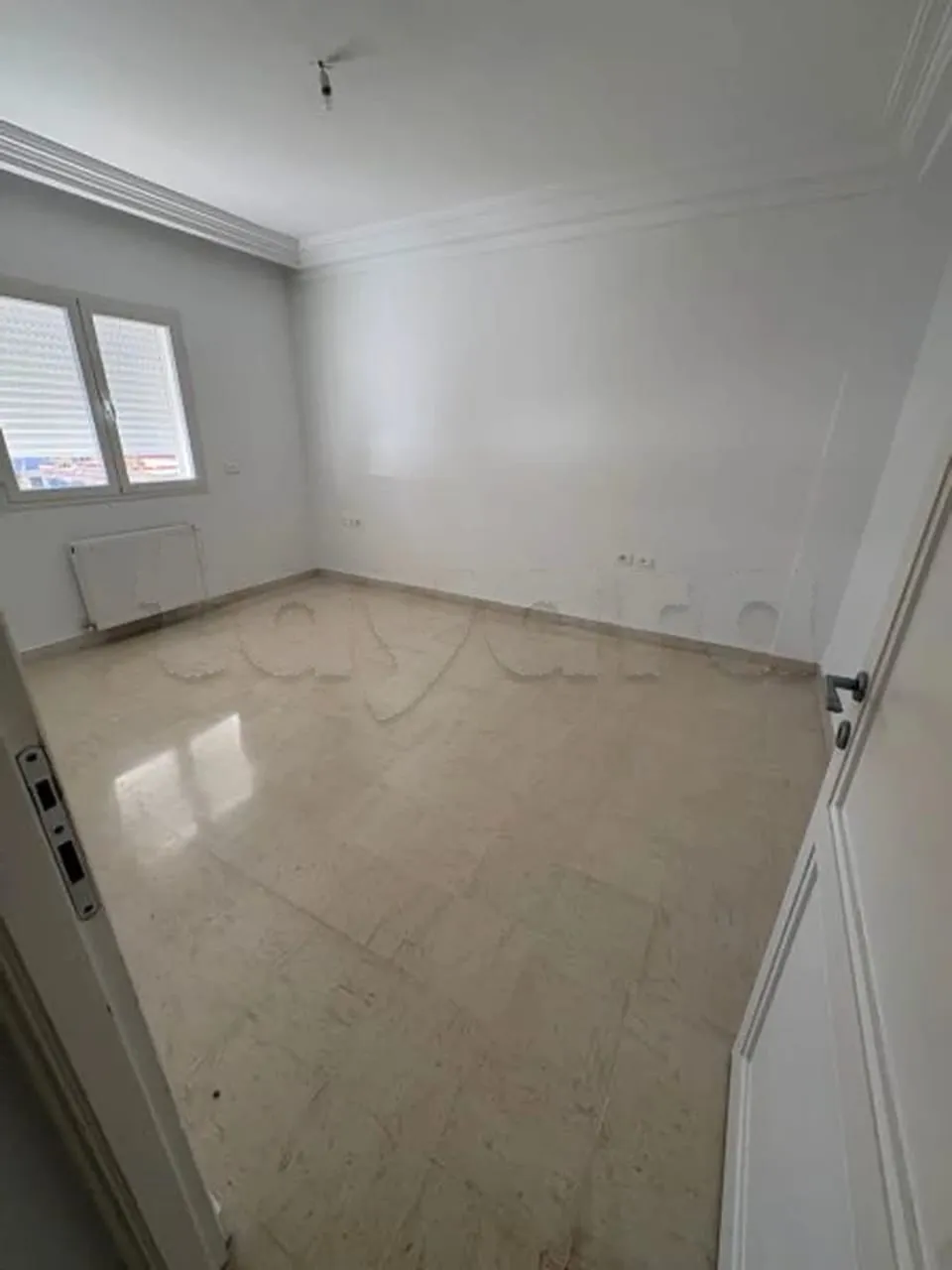 un appartement s+3 Haut Standing au 1er étage a louer a Soukra Rue Du Parc