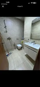 un appartement haut standing s+1 richement meublé au 1er étage a louer situé a jardin d'el manzah 1
